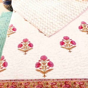 Pink floral motif handblock single bed quilt