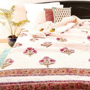 Pink floral motif handblock single bed quilt